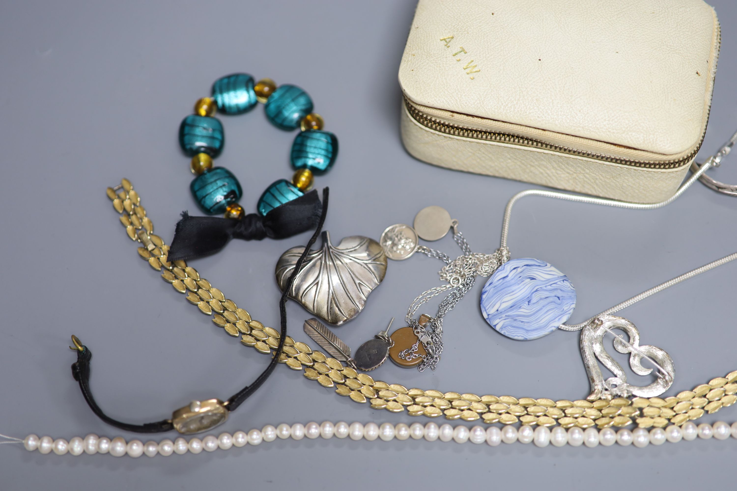 A ladys 9ct gold manual wind wrist watch and a small quantity of jewellery including white metal and costume.